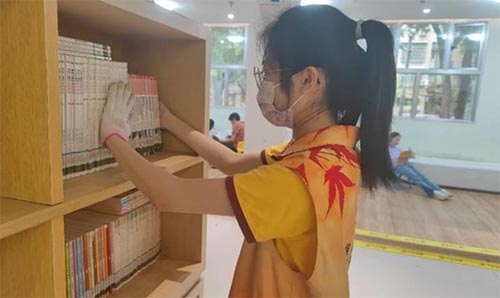 商學(xué)院5月20日開展“共沐書香，閱見美好”志愿活動